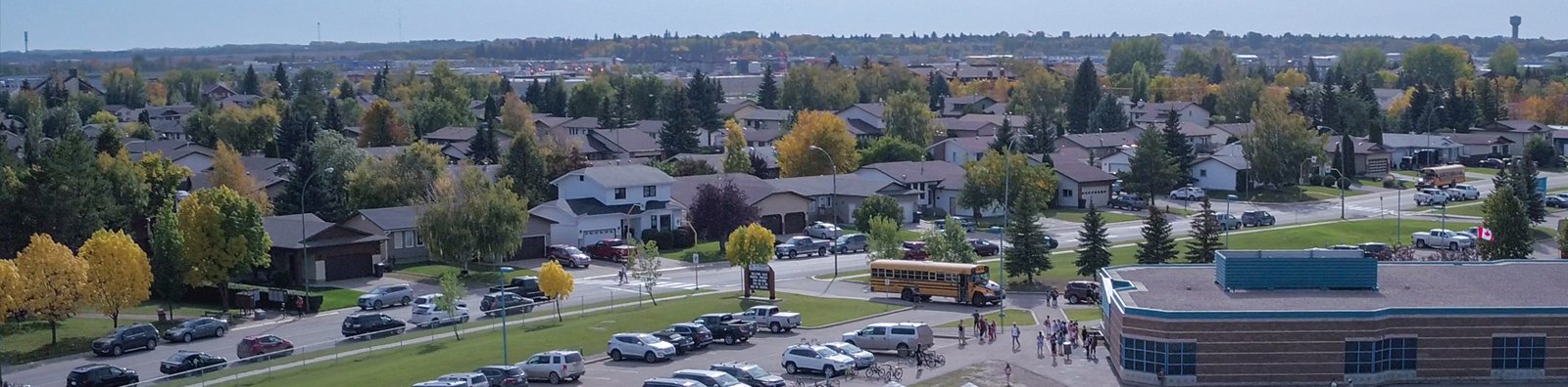 aerial of houses and school