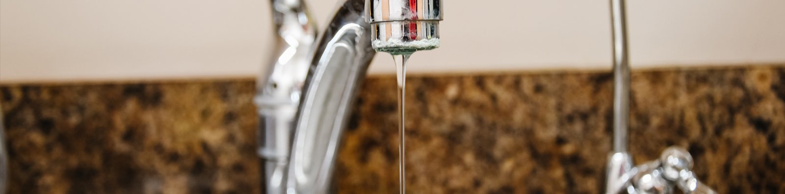 water dripping out of tap