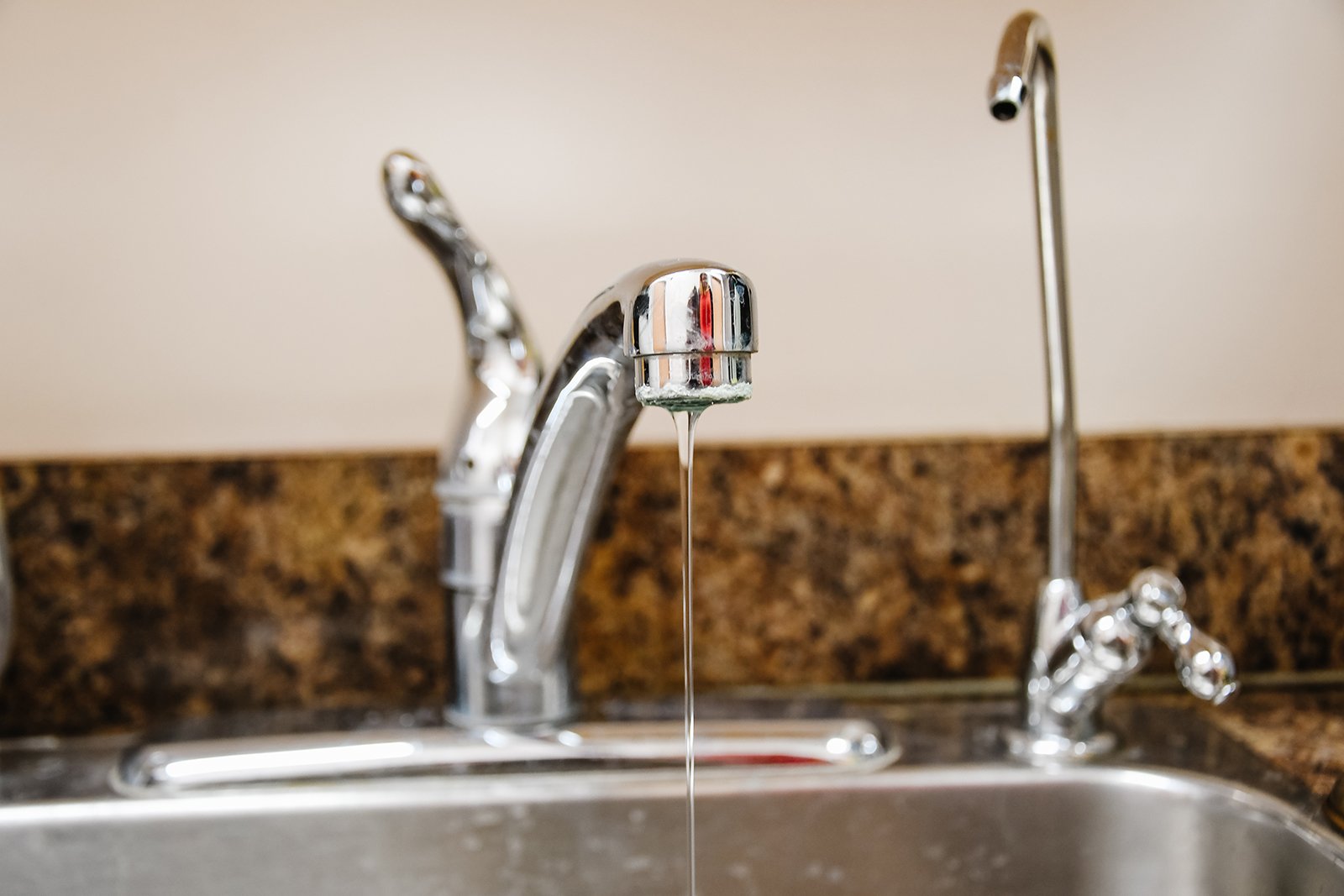 water pouring out of tap